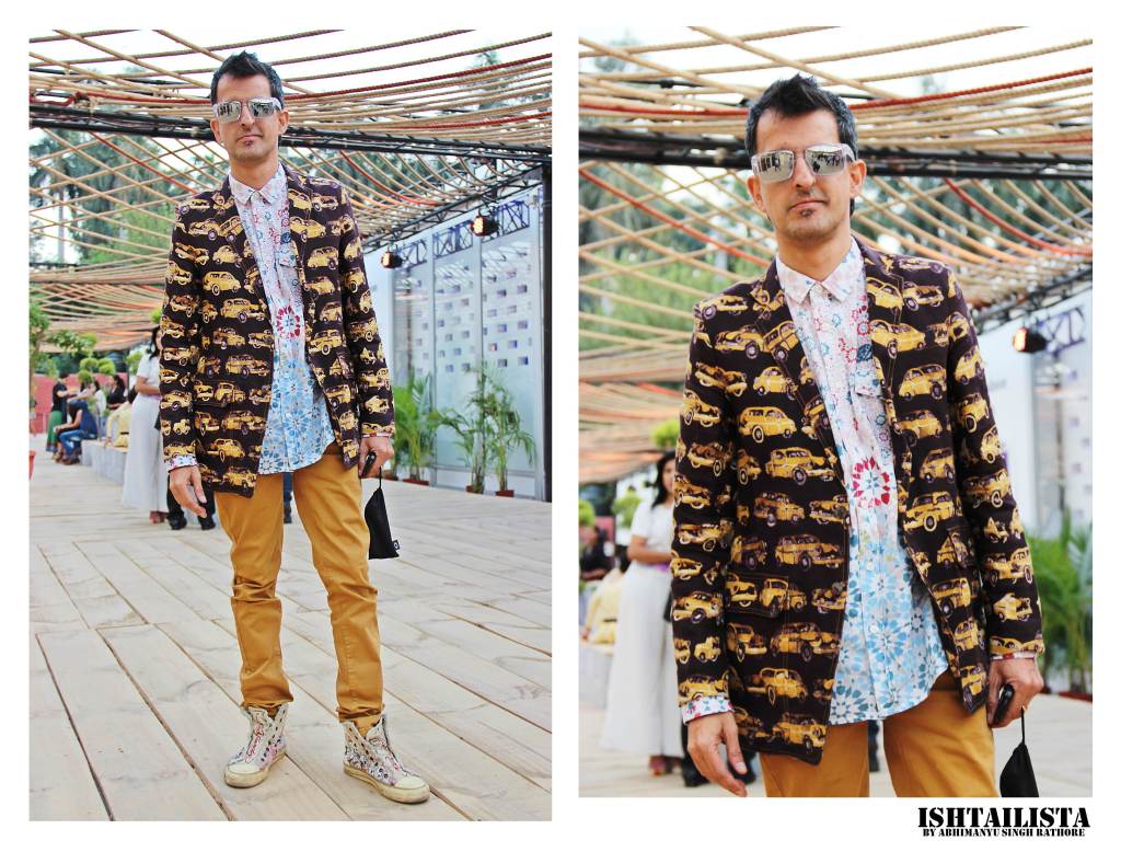 Love the quirky printed jacket paired with printed shirt and tan chinos. Did you notice the stunning Ed Hardy Shoes.